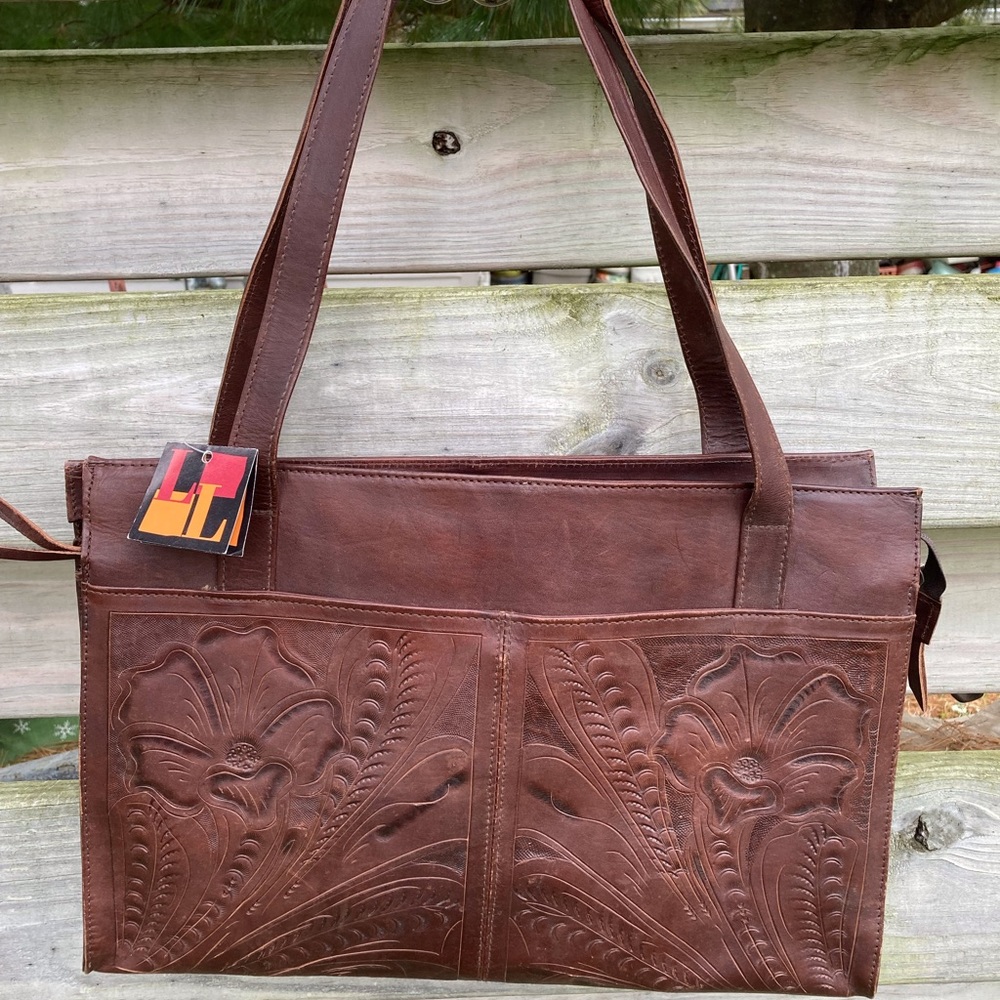 Carved leather tote